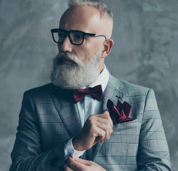 man adjusting cufflink