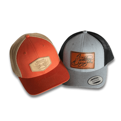 two leather patch hats